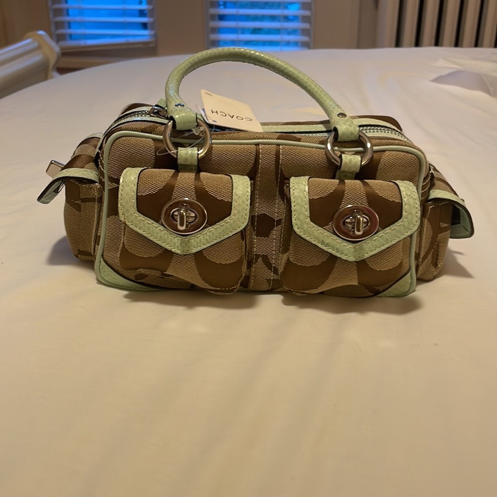 Coach mini tote 10.5inW/4.5inH Teal snakeskin leather trim,lavender satin liner.